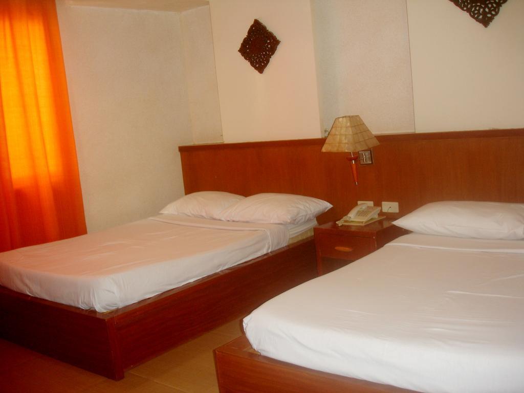 Roxas Midtown Hotel Cameră foto